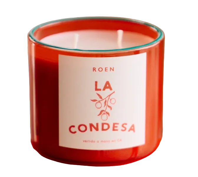 LA CONDESA scented candle in red glass jar, front label visible