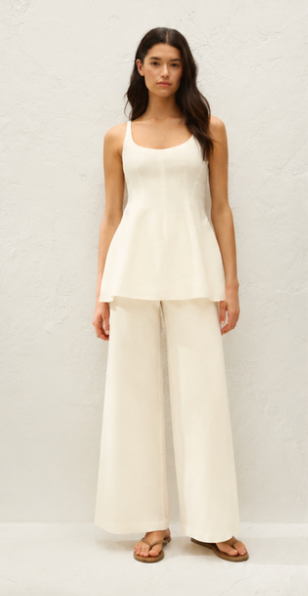 Off-white wide-leg pants with clean front and relaxed straight-leg cut