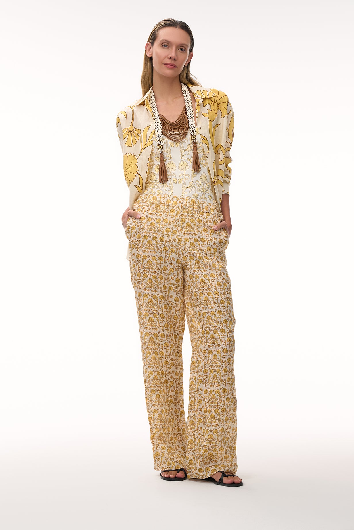 Linen button-up shirt with yellow floral print, collared long sleeves