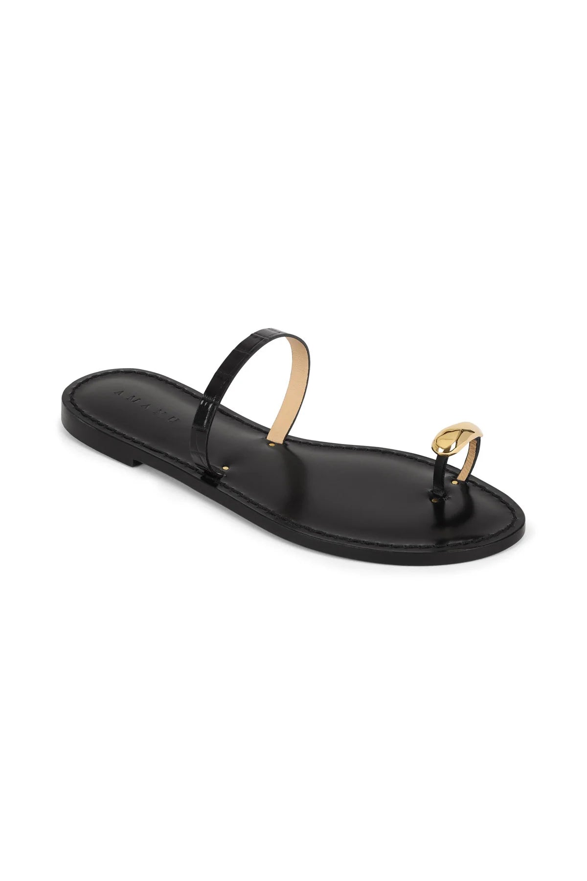 Black slide sandal with gold-tone buckle strap and open toe sole