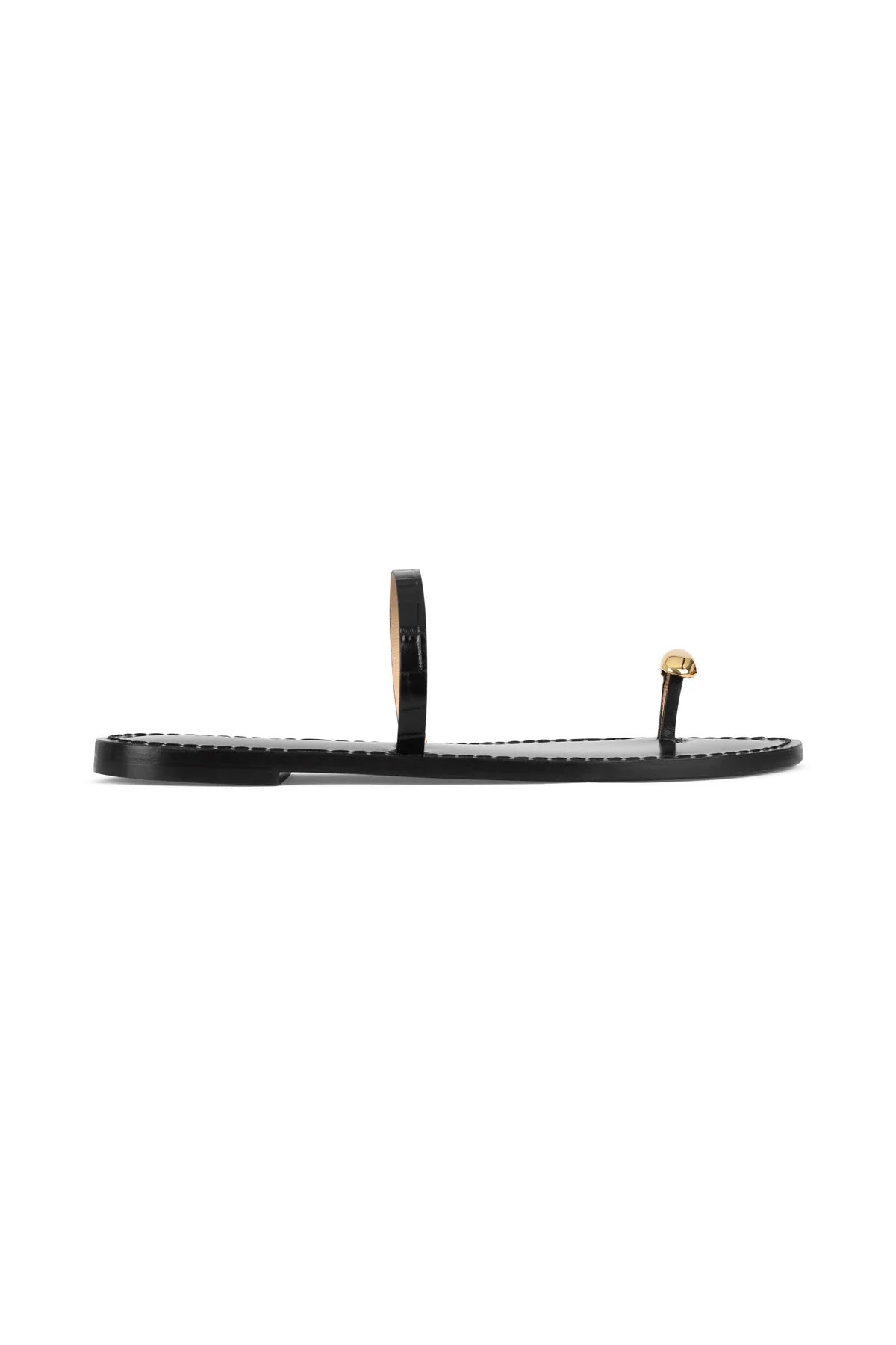 Black flat thong sandal with narrow straps and gold buckle accents