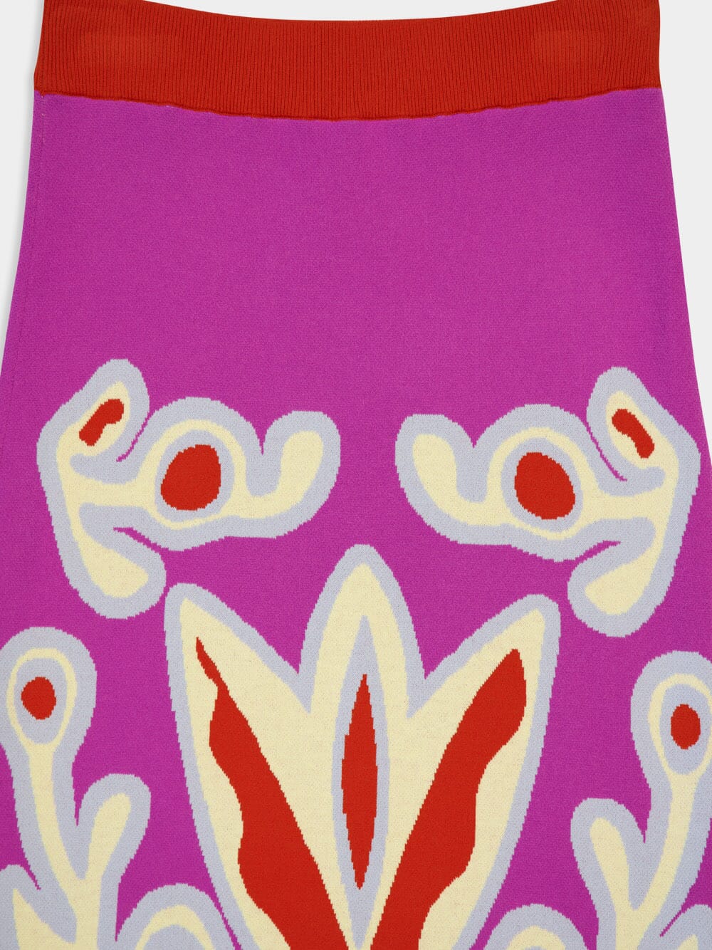Purple jacquard skirt with orange waistband and orange-and-cream motif print