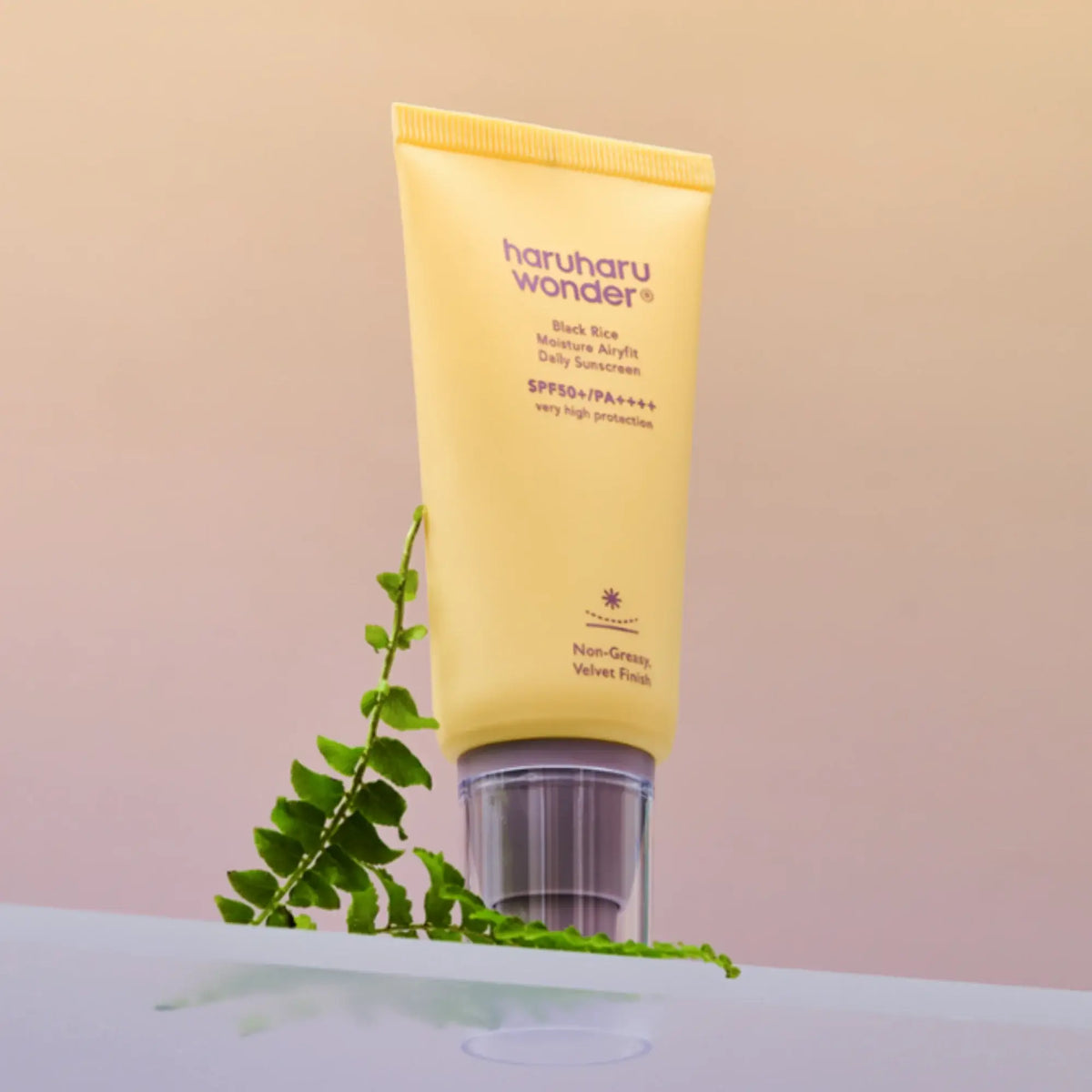 Sunscreen squeeze tube standing upright, yellow-gold cap, 50 ml
