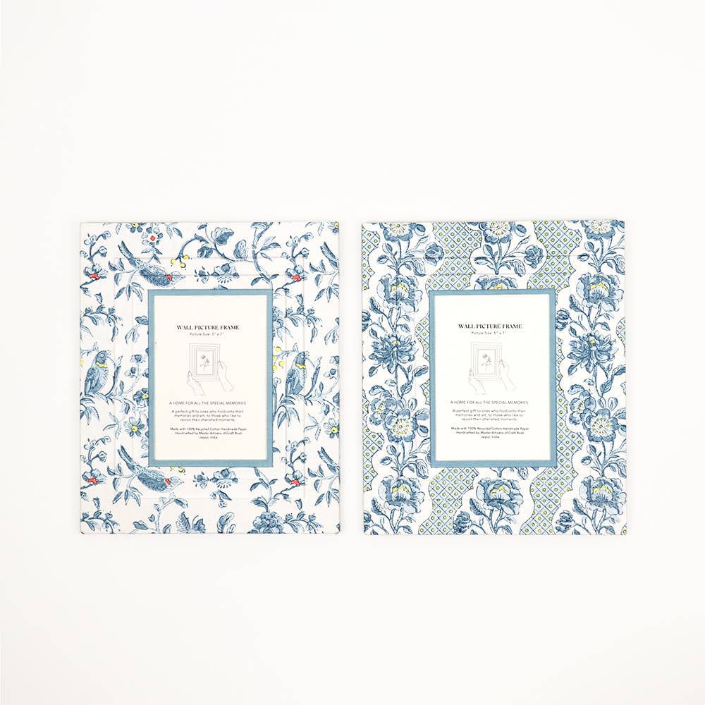 Pair of blue block-printed wall picture frames with floral trellis design and white mats