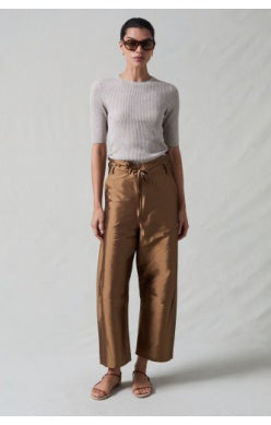 Chan Luu Techno Taffeta barrel pants in brown with a drawstring waist and cropped wide legs