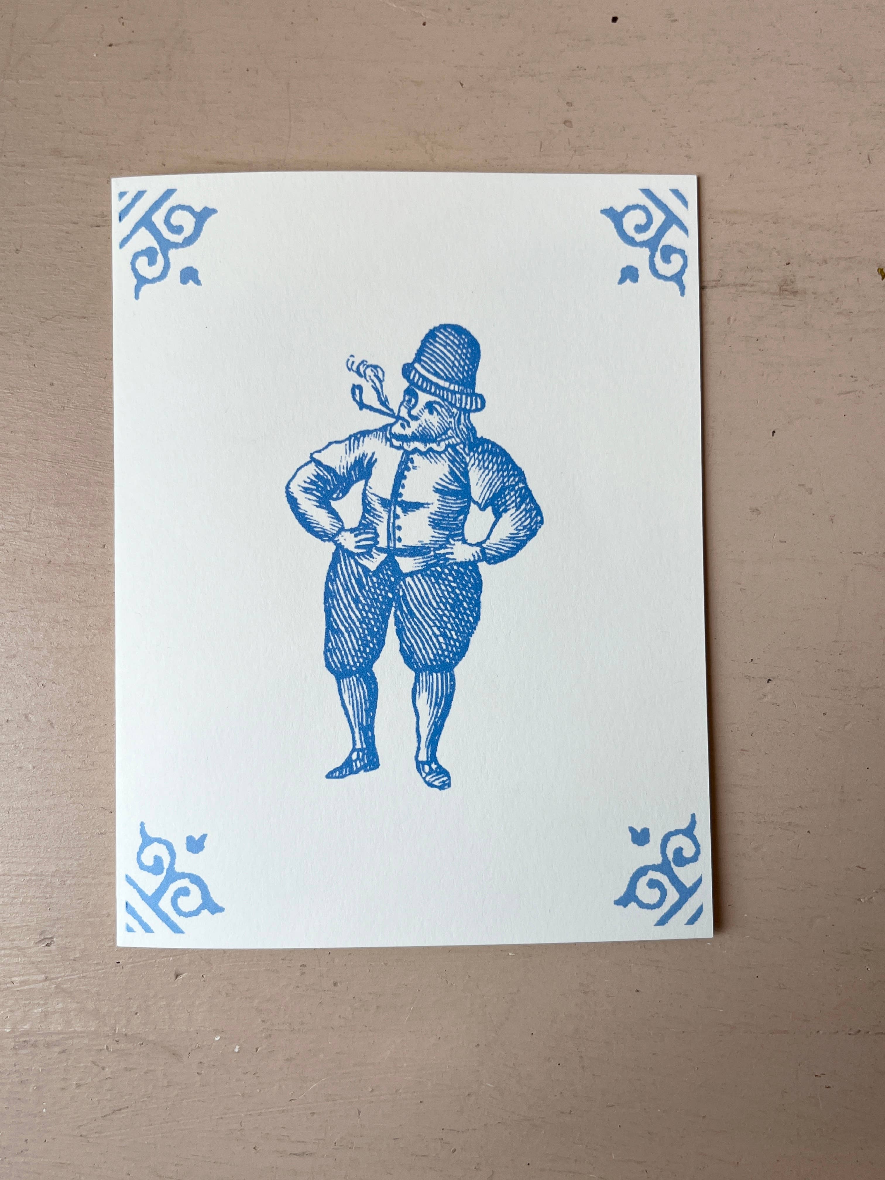 White card with blue illustration of a costumed man holding a jug, ornate corner motifs