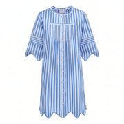 Blue and white striped button-front dress with scalloped cuffs and ruffled hem