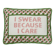 Embroidered throw pillow with 'I SWEAR BECAUSE I CARE' text and braided border