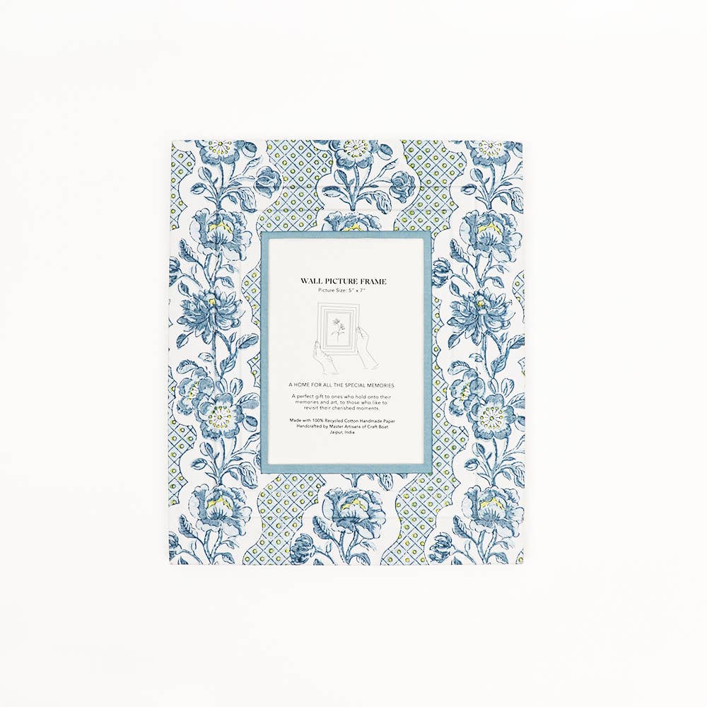 Blue block-printed wall picture frame with floral trellis pattern and white photo mat