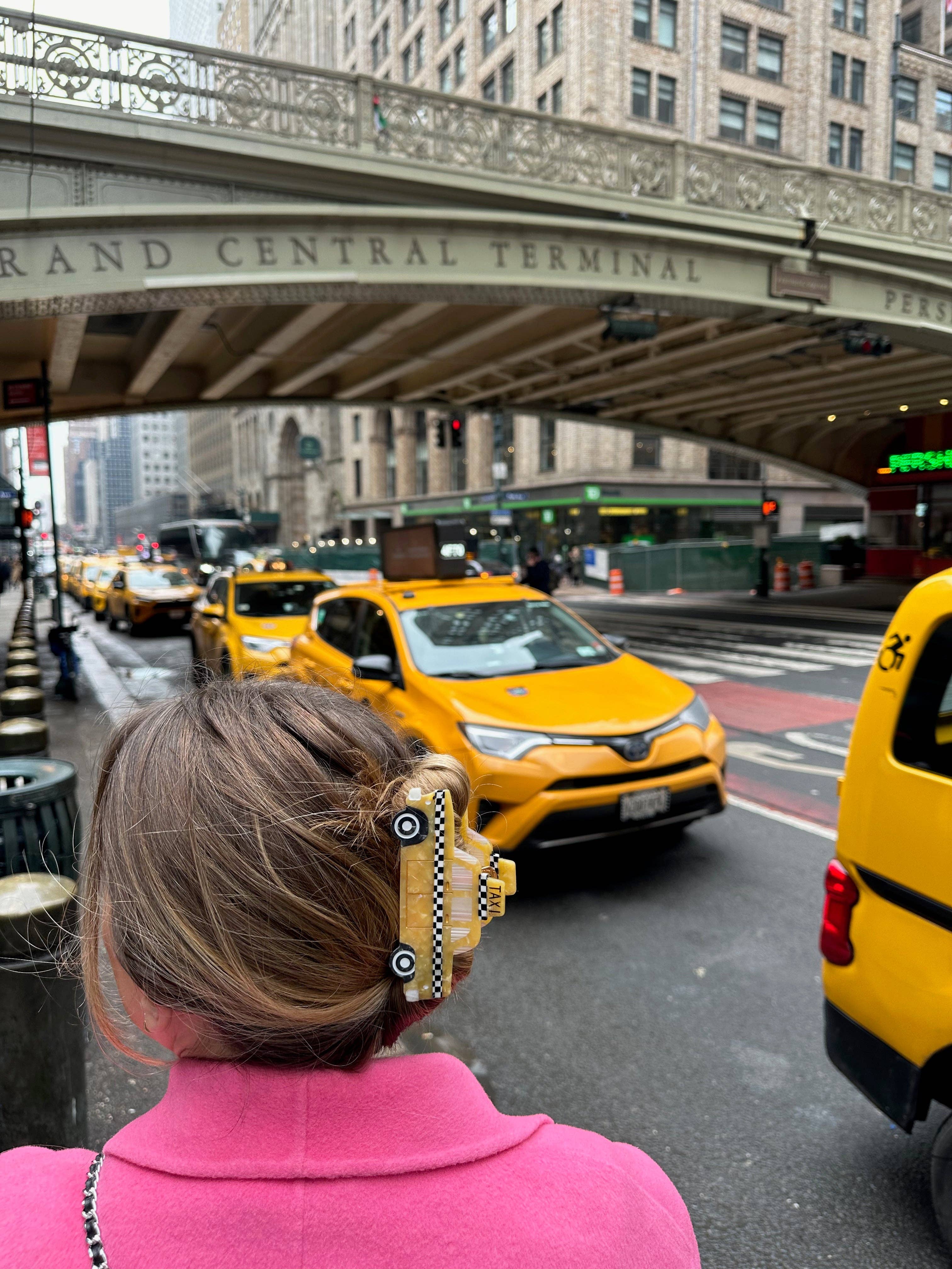 Taxi cab claw hair clip with checkered stripe and TAXI sign on hair