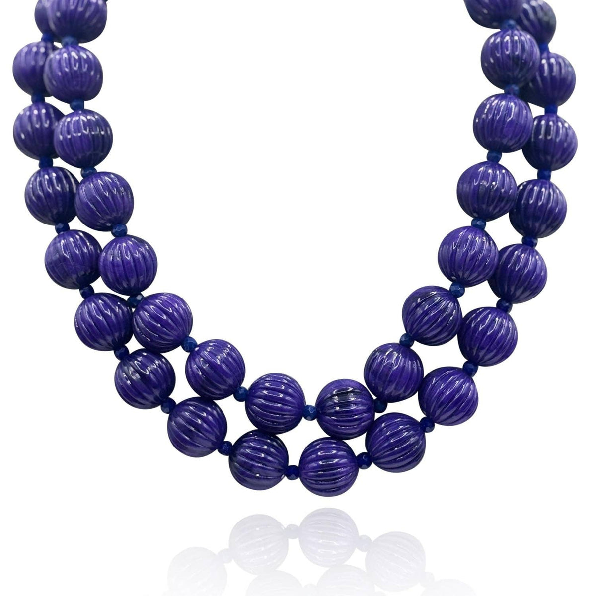 Purple carved melon bead necklace, close-up of rounded bead strands