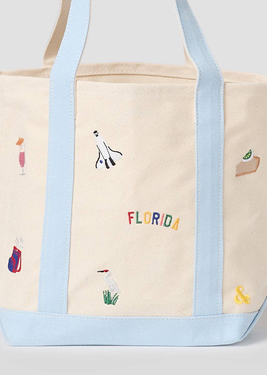 Small canvas tote front panel with Florida icon embroidery and light blue border
