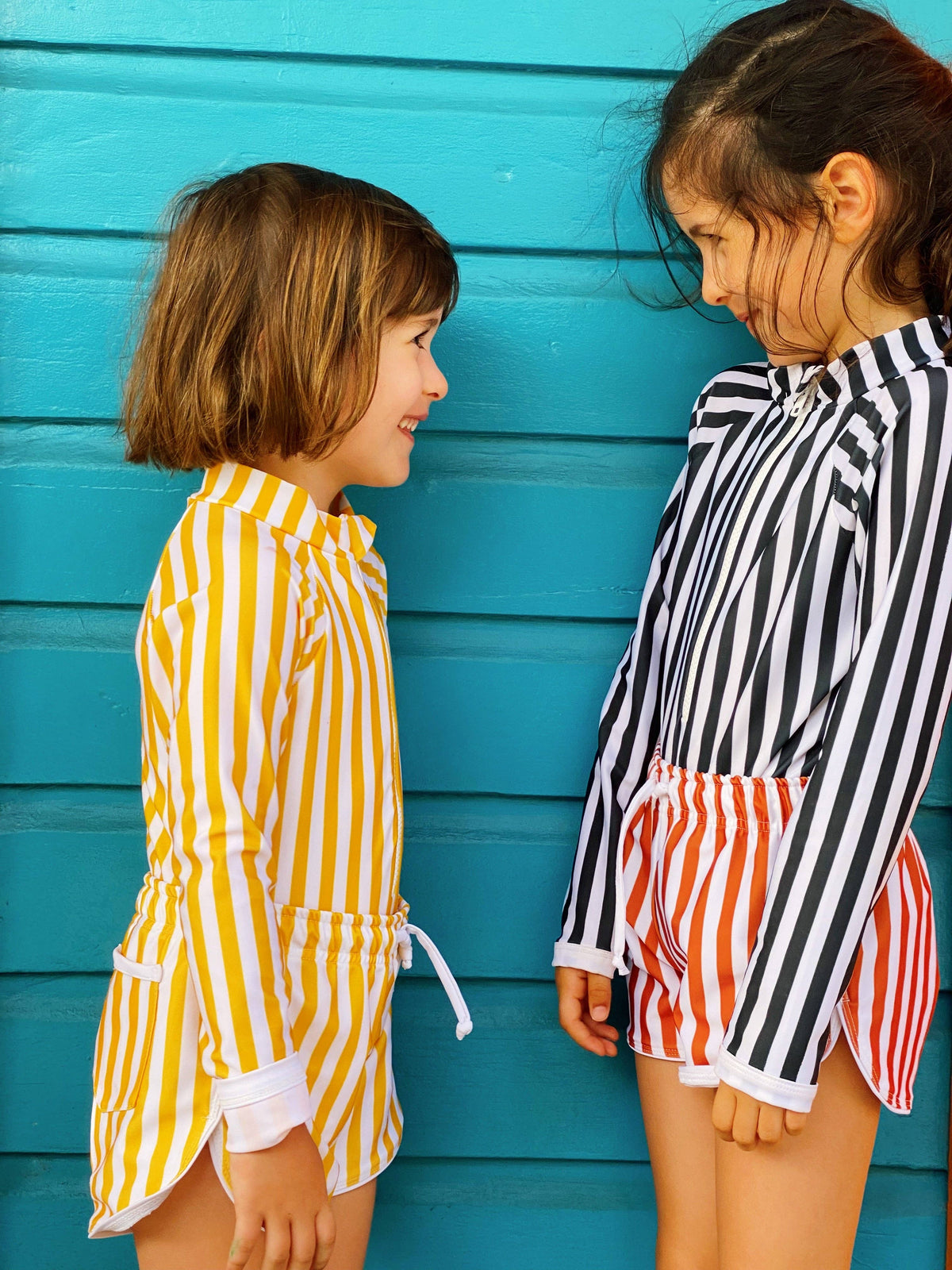 Yellow-and-white striped short shorts with drawstring tie at waist and side pocket