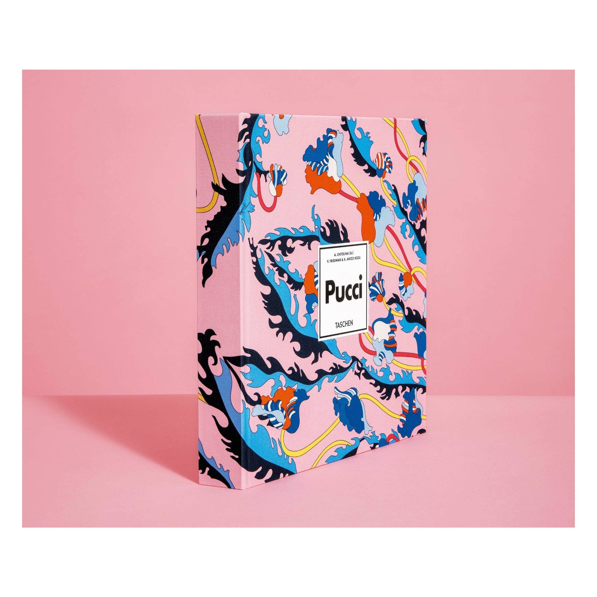 Pucci fashion book with colorful wave and floral pattern cover and TaschEN logo.