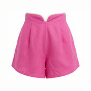 Pink linen shorts with wide waistband and front pleats