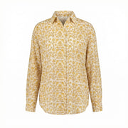 Linen shirt with yellow floral print, button front, pointed collar, long sleeves.