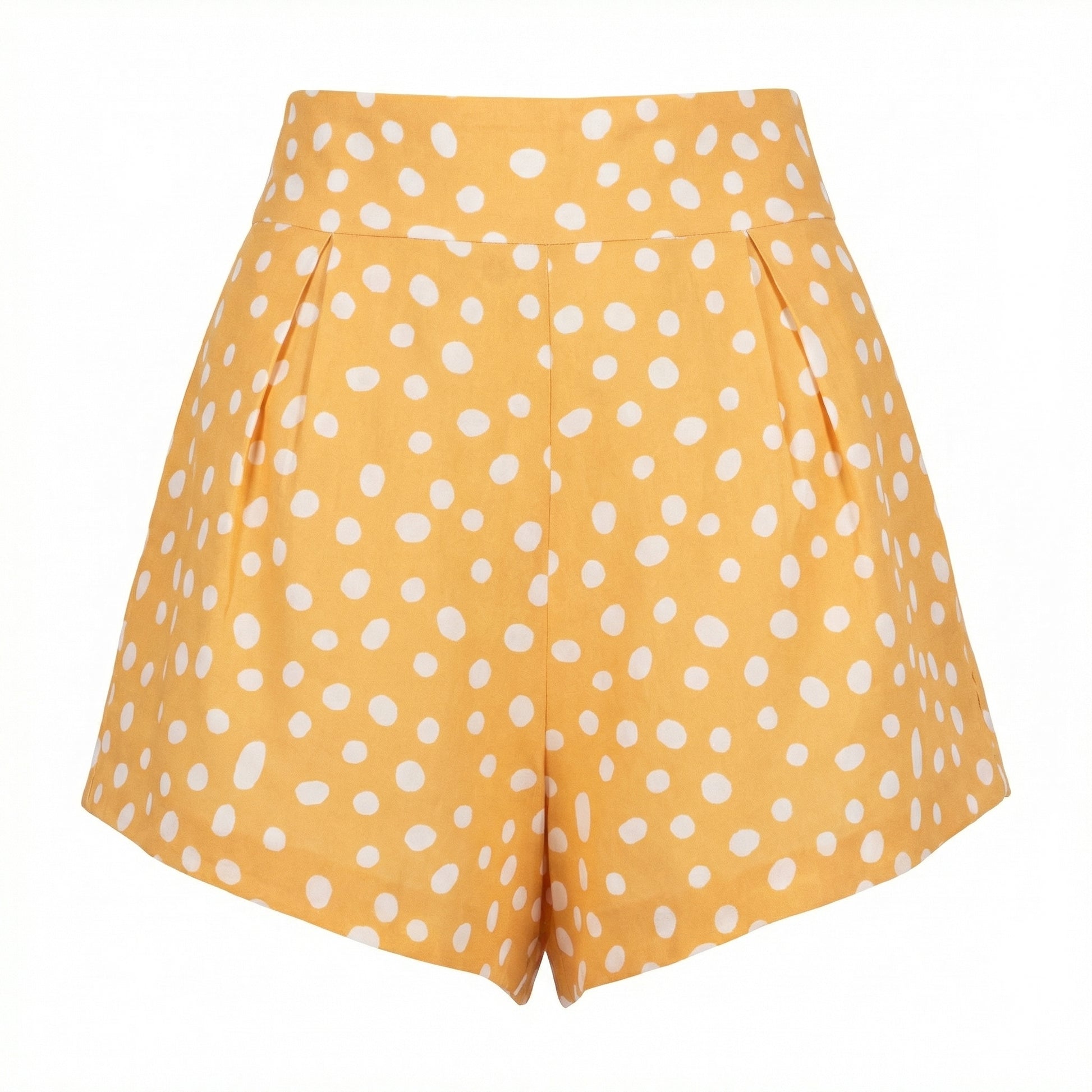 High-waisted polka dot shorts with white dots on orange, pleated front
