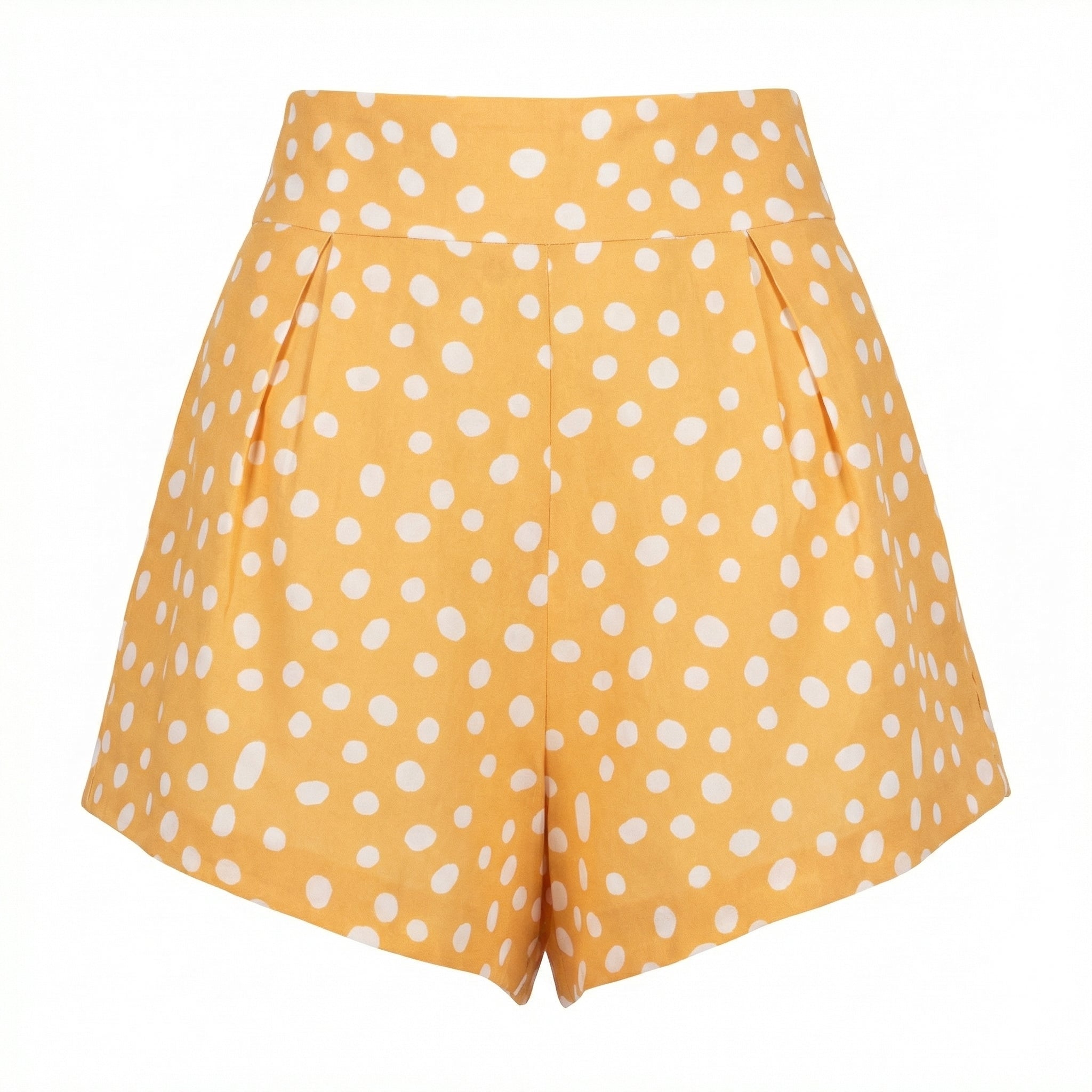 High-waisted polka dot shorts with white dots on orange, pleated front