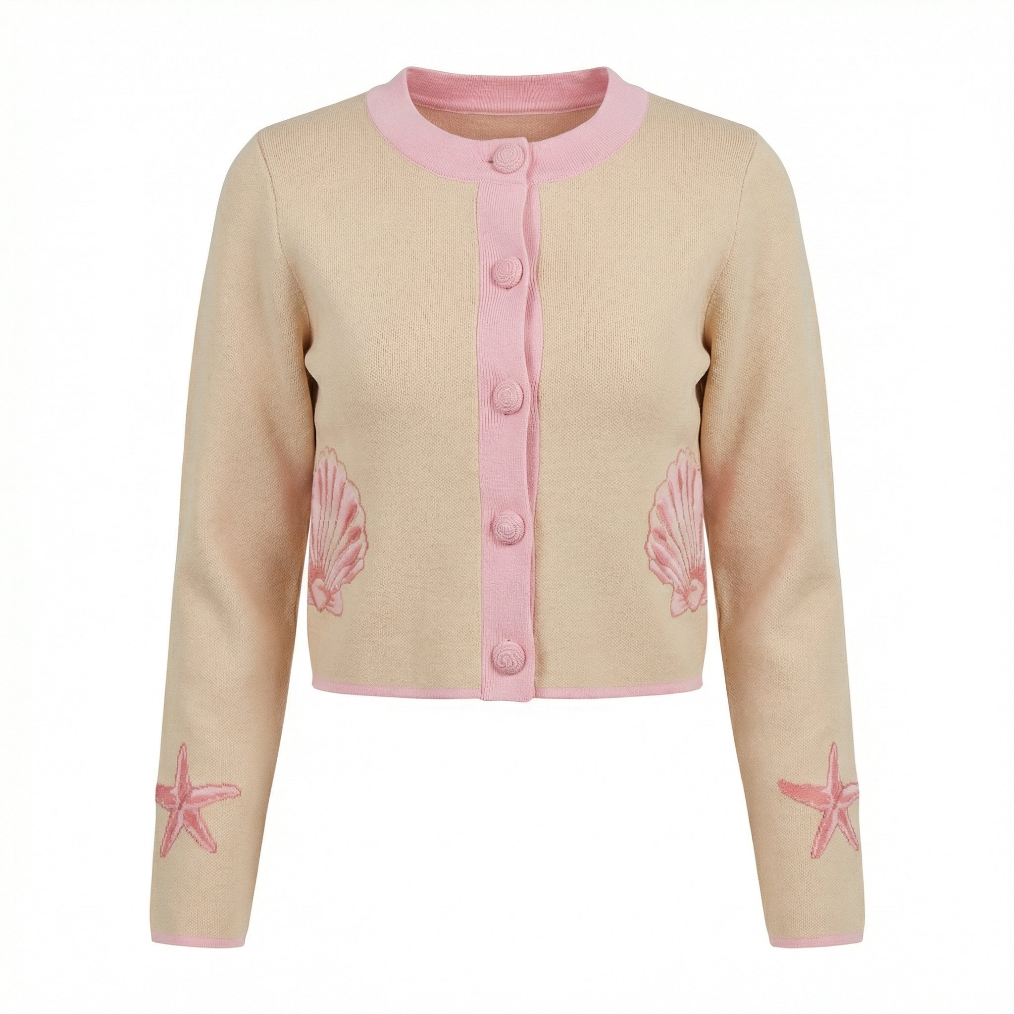 Beige cardigan with pink button placket and shell prints at cuffs
