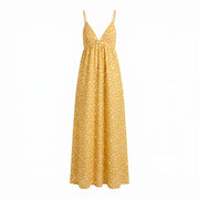 Polka dot maxi dress with V-neck and spaghetti straps, yellow with white dots