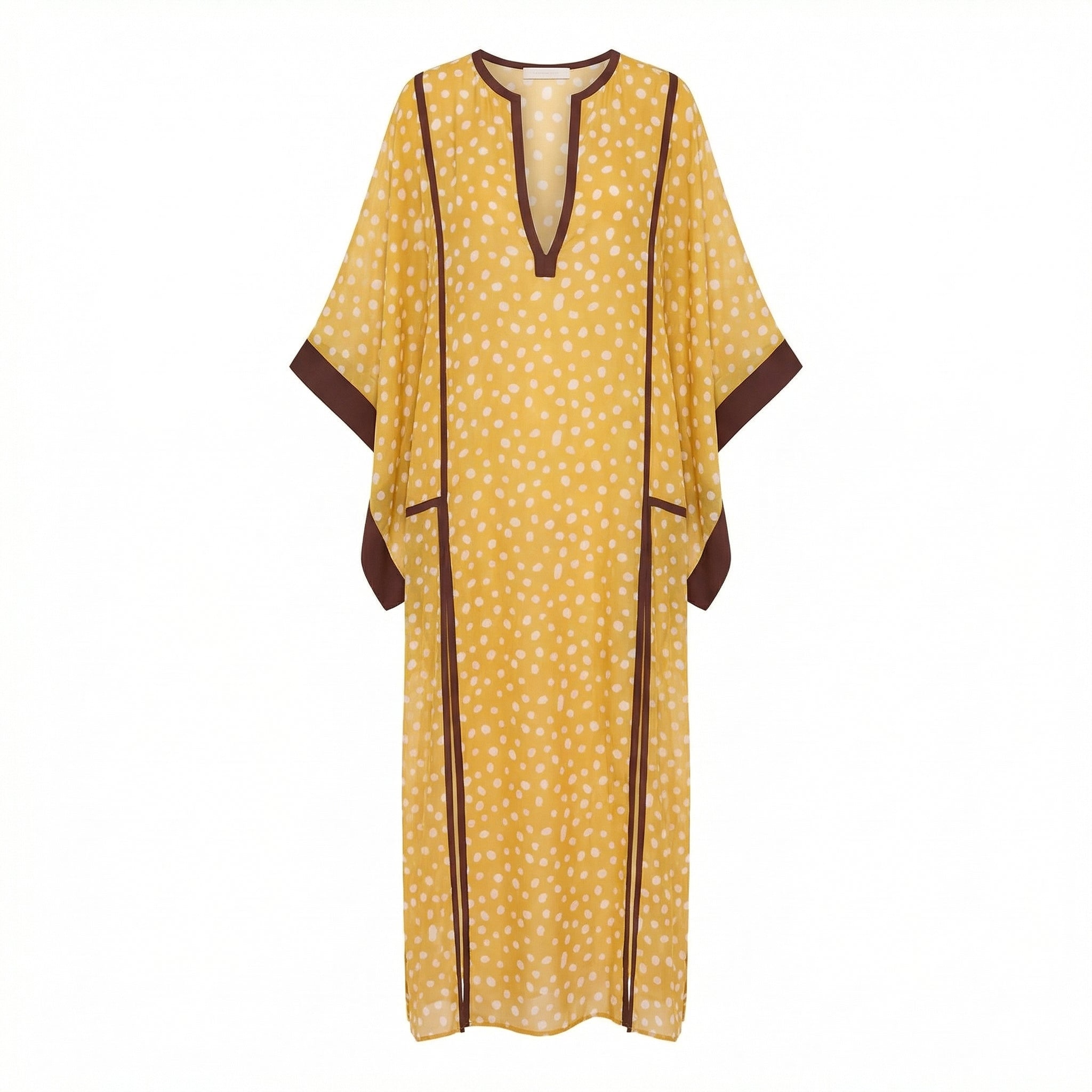 Mustard maxi kaftan with white polka dots, dark V-neck, and long side slits