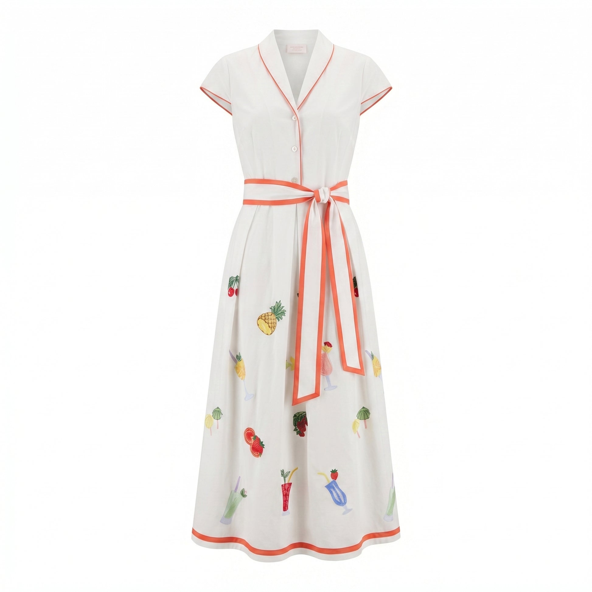 White garden dress with V-neck, button front, orange trim, fruit print and tied waist.