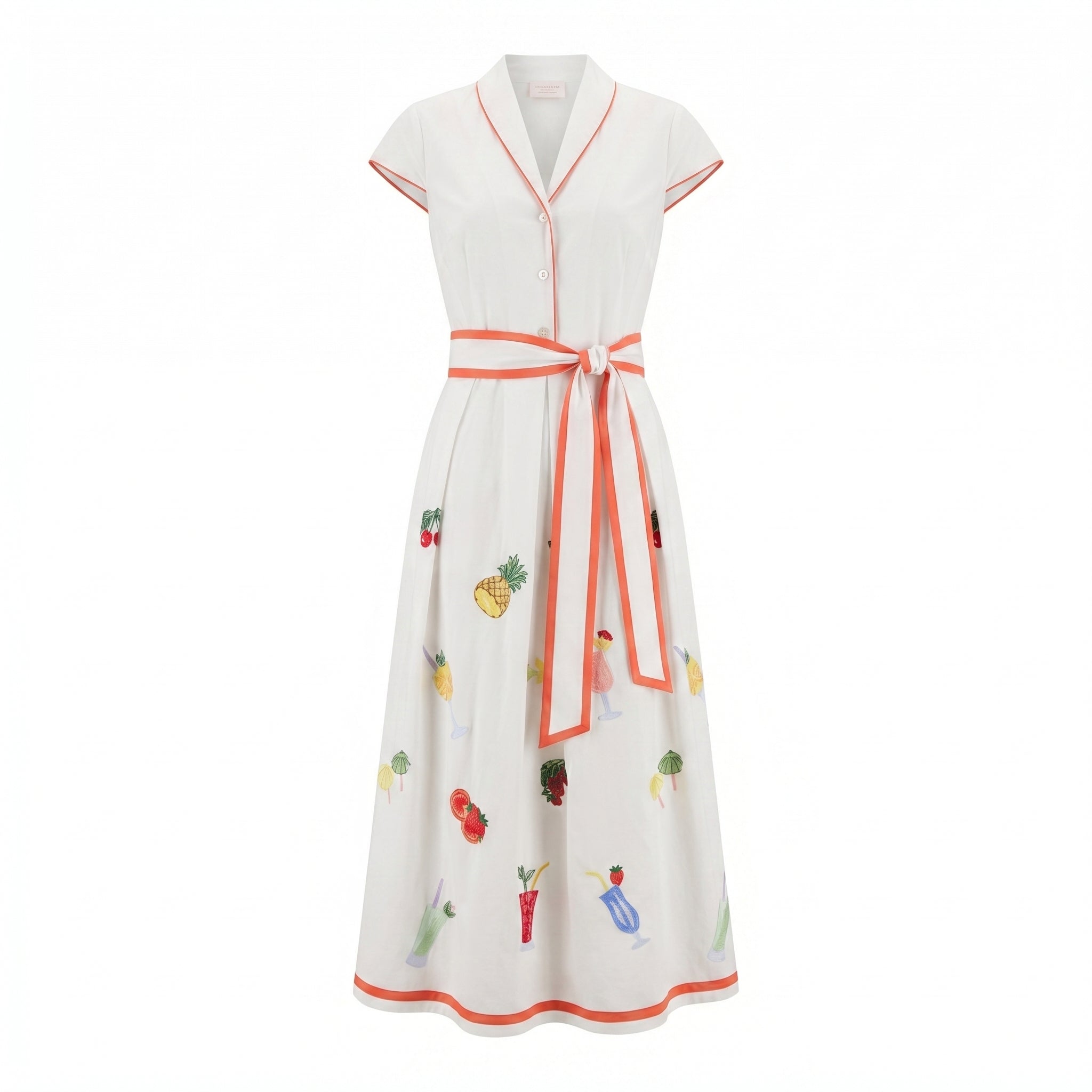 White garden dress with V-neck, button front, orange trim, fruit print and tied waist.