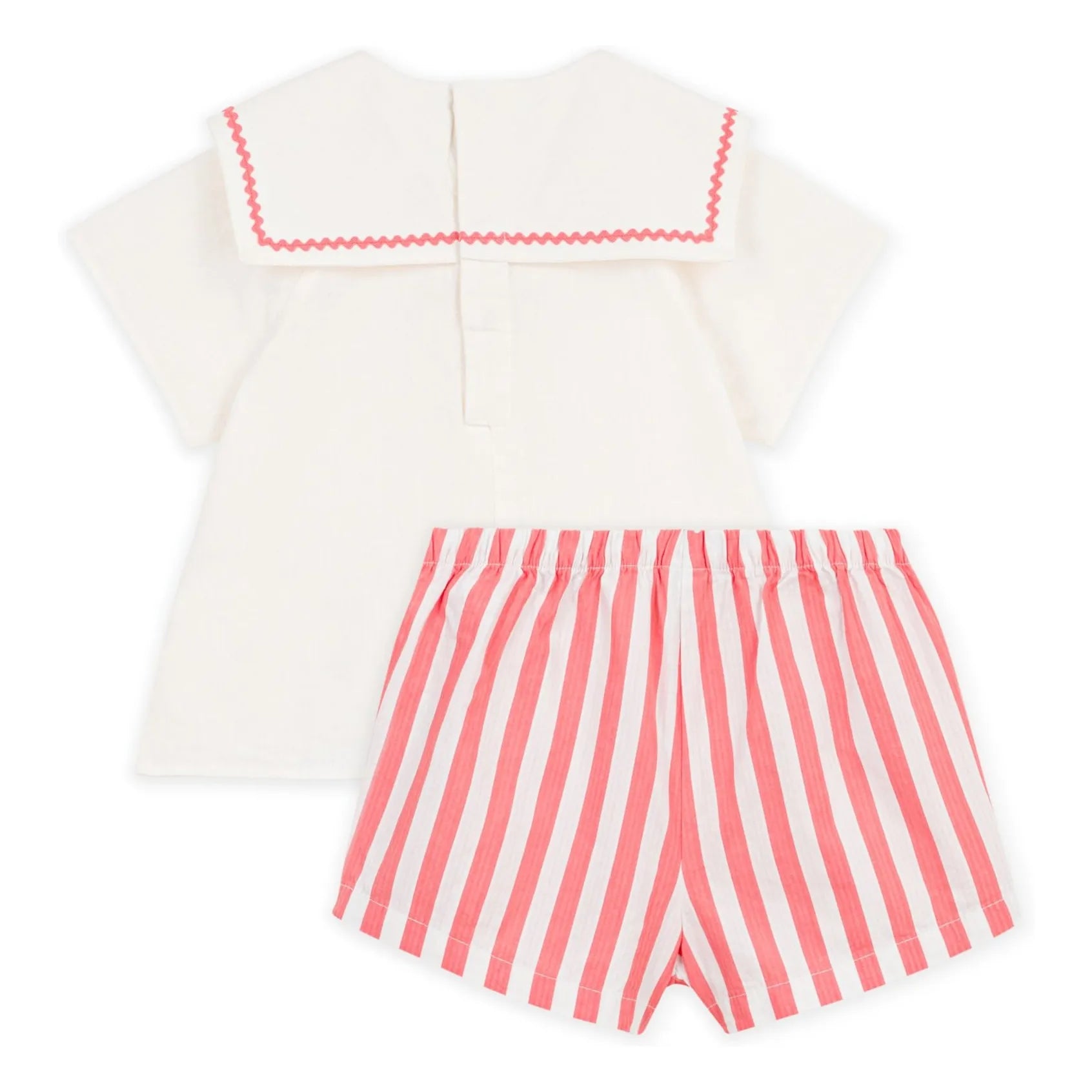 Back cream sailor top with pink zigzag trim and pink-and-white striped shorts