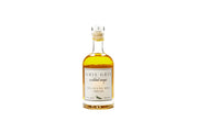Jalapeño hex simple syrup bottle with amber liquid and GRIS GRIS label
