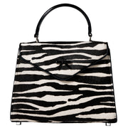 Lauren Belgian bag with zebra-print flap, top handles, and black trim